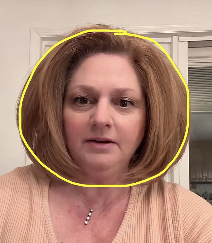 Middle-aged woman with shoulder-length hair and beige top giving a cream cheese review sparking internet buzz. Middle-aged woman with shoulder-length hair and beige top giving a cream cheese review sparking internet buzz.