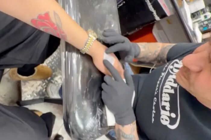 Tattoo artist working on Amanda Bynes&rsquo; new tattoo, highlighting the tragic tale of child stars and fan concerns.