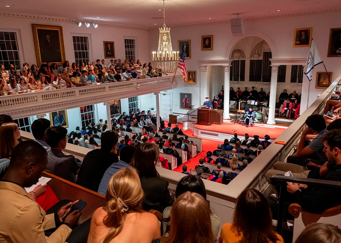 Audience attending Amherst College event in a historic hall as firing spree follows raunchy orientation backlash Audience attending Amherst College event in a historic hall as firing spree follows raunchy orientation backlash