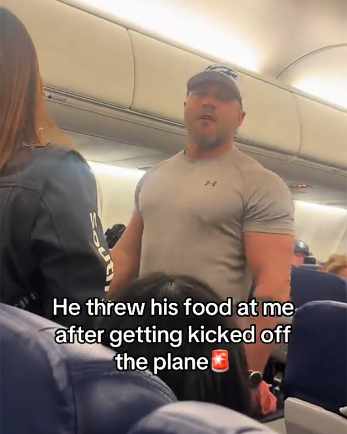 Bodybuilder removed from flight after erupting in fury at elderly passenger, causing disturbance on airplane.