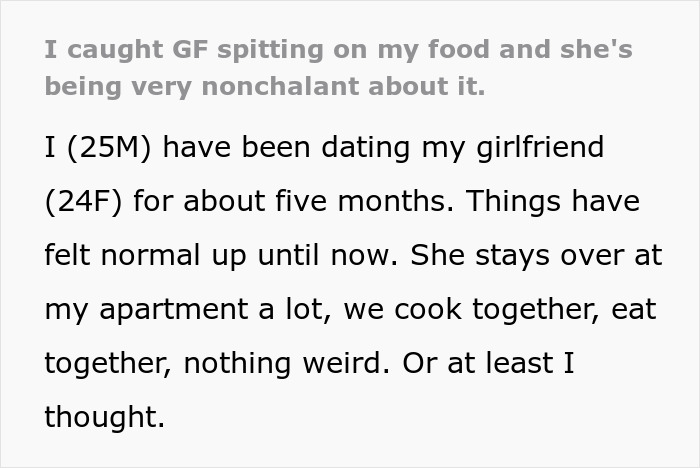 Guy horrified after witnessing girlfriend spitting in his food, capturing shock and disbelief in a tense moment.