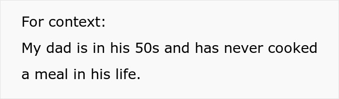 Dad and brother cooking food together in a kitchen, preparing a meal with fresh ingredients and smiling.