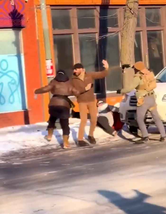 Group of people in winter clothes on a snowy street during viral clips of Alex Pretti before his fatal encounter. Group of people in winter clothes on a snowy street during viral clips of Alex Pretti before his fatal encounter.