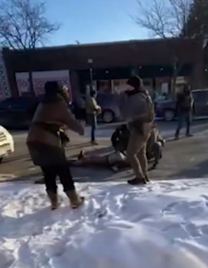 Viral clips show Alex Pretti holding his phone moments before a fatal encounter on a snowy street with bystanders nearby. Viral clips show Alex Pretti holding his phone moments before a fatal encounter on a snowy street with bystanders nearby.