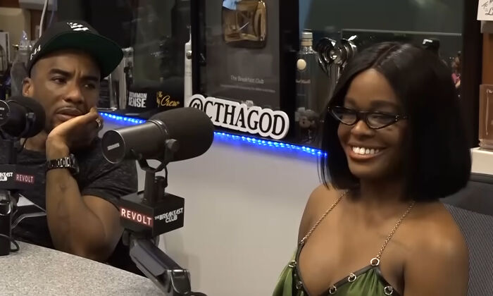 Two celebrities at a radio interview, reacting with amusement and skepticism to an invasive question.