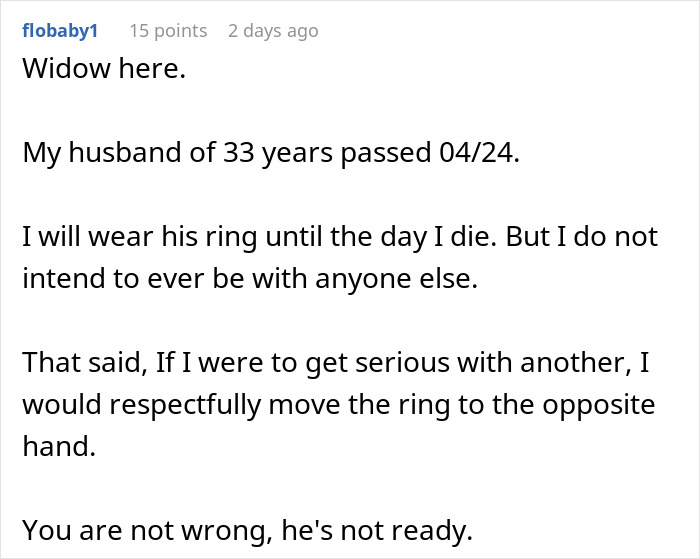 Comment from a widower explaining wearing her late husband's ring and moving it if dating again after losing him.