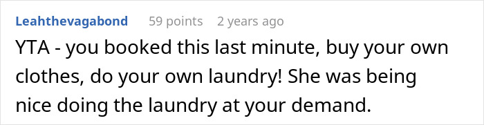 Screenshot of a Reddit comment where a user criticizes a man blaming his wife for having no slacks for his business trip.