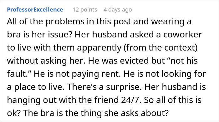Woman at home without wearing a bra, causing discomfort and tension with her husband in a domestic setting. Woman at home without wearing a bra, causing discomfort and tension with her husband in a domestic setting.