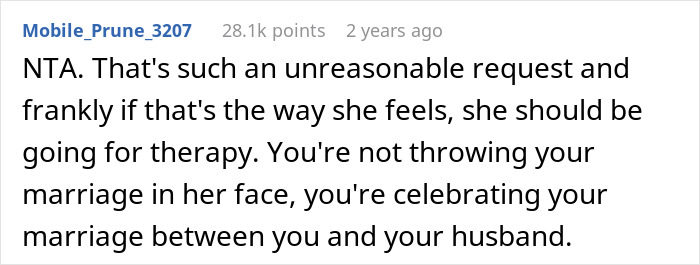 Screenshot of a Reddit comment discussing a woman demanding her friend kick out her husband from a romantic getaway.