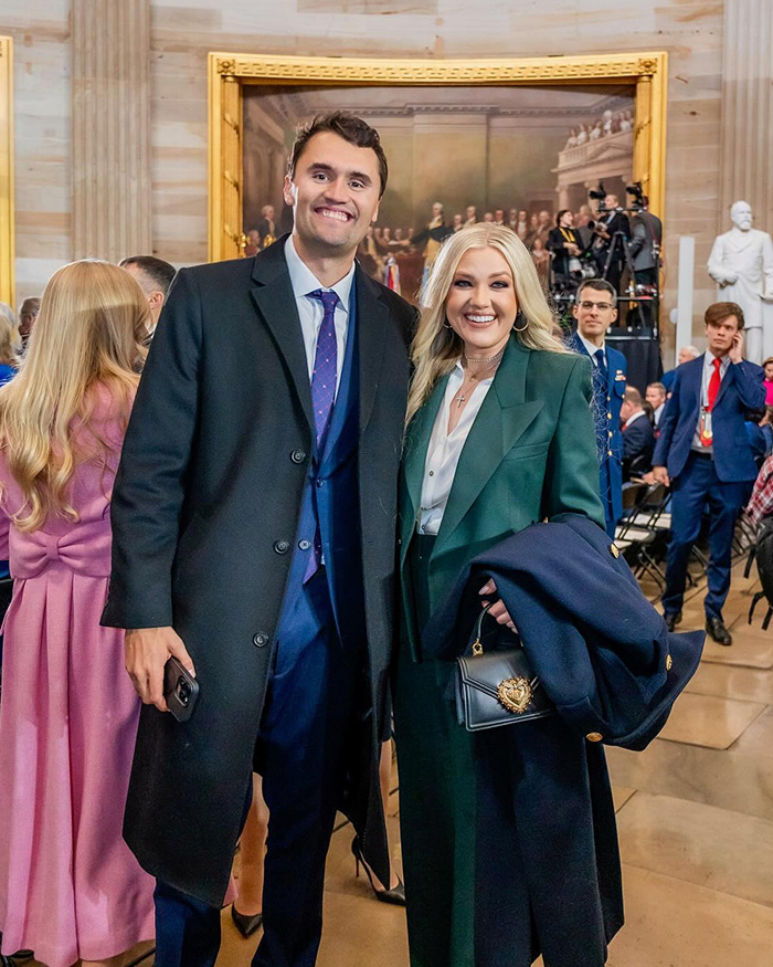 Erika Kirk in a green coat at a formal event, facing custody speculation amid explosive congresswoman remark.