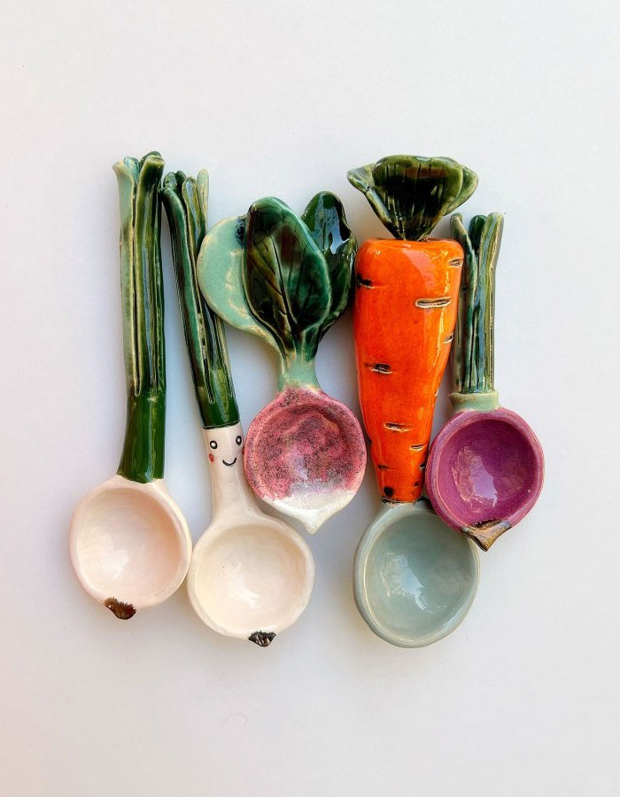 Colorful ceramic measuring spoons shaped like vegetables, showcasing creative and cool interior design ideas for kitchen decor.