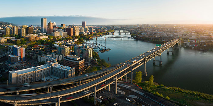 Aerial cityscape at sunrise with river, bridges and elevated highway, Tokyo travel keyword