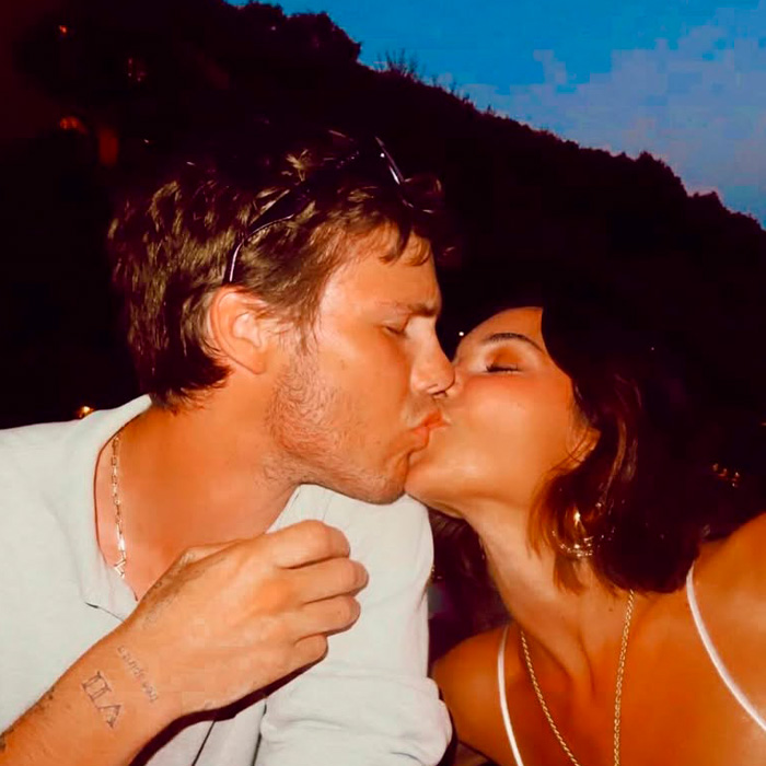 Cruz Beckham kissing his mom lookalike girlfriend during an evening outing, sparking how old is she buzz.