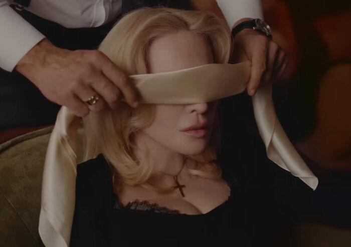 Madonna in Dolce & Gabbana ad with younger men and a provocative c****h shot in a controversial fashion campaign.