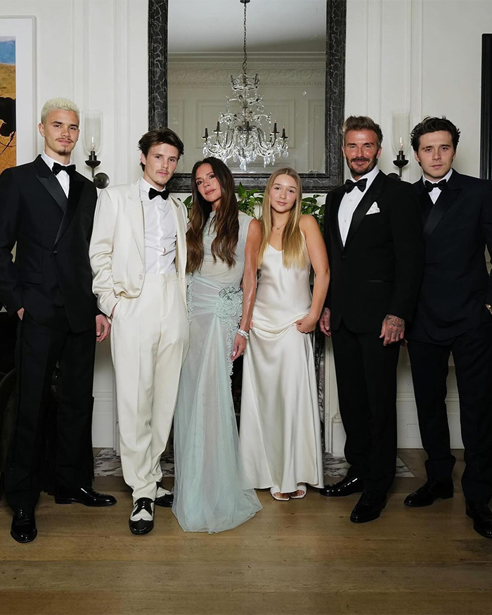 David Beckham and family dressed formally, posing indoors amid ongoing family rift and worst crisis faced together.