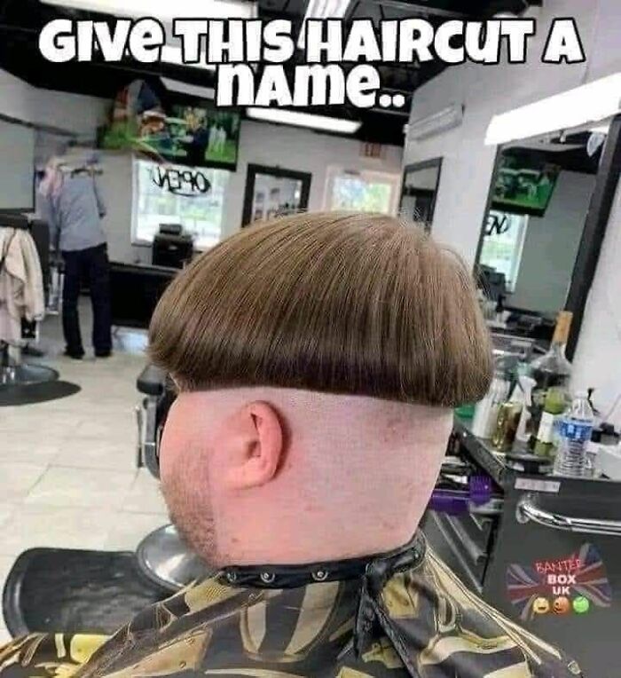 Man with a disastrous hairstyle featuring a bowl cut with shaved sides sitting in a barber shop chair.