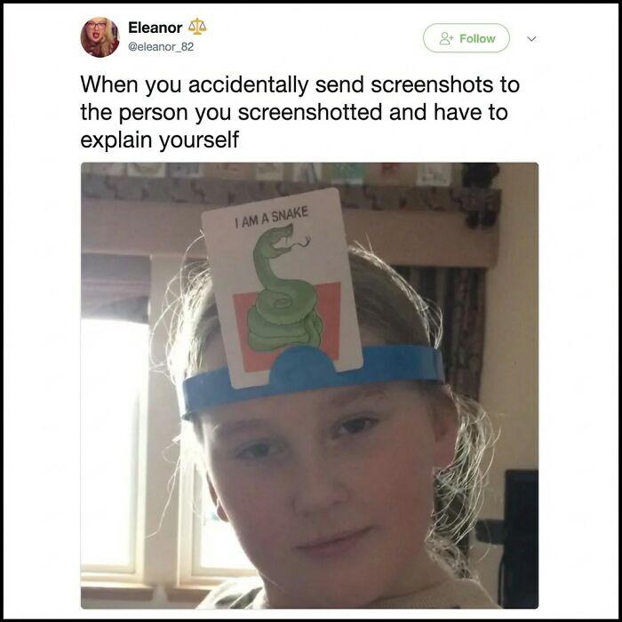 A young person wearing a headband with a card reading I am a snake, illustrating funny memes randomness awkward moments.