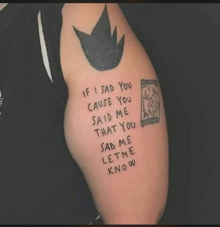 Tattoo on arm with confusing text, illustrating people breaking their brain trying to understand what they read.