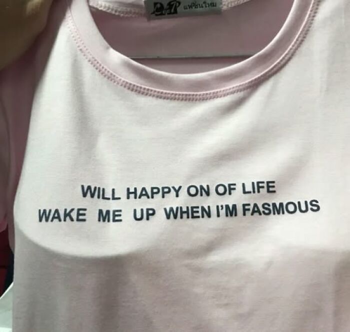 Pink t-shirt with confusing text that breaks the brain trying to understand what it says, featuring misspelled words.