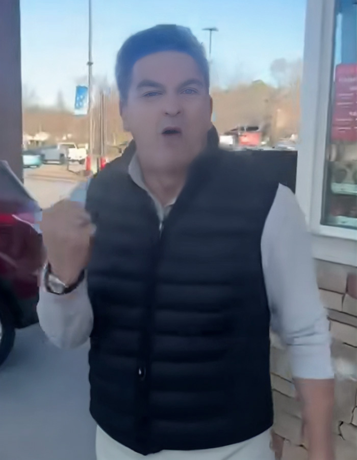 Man referred to as male version of Karen having a public meltdown outside a store during daytime.