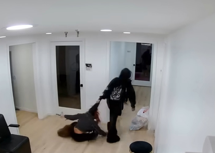 Maryland hairstylist dragging teen client by hair through salon captured in viral video inside a white modern salon room