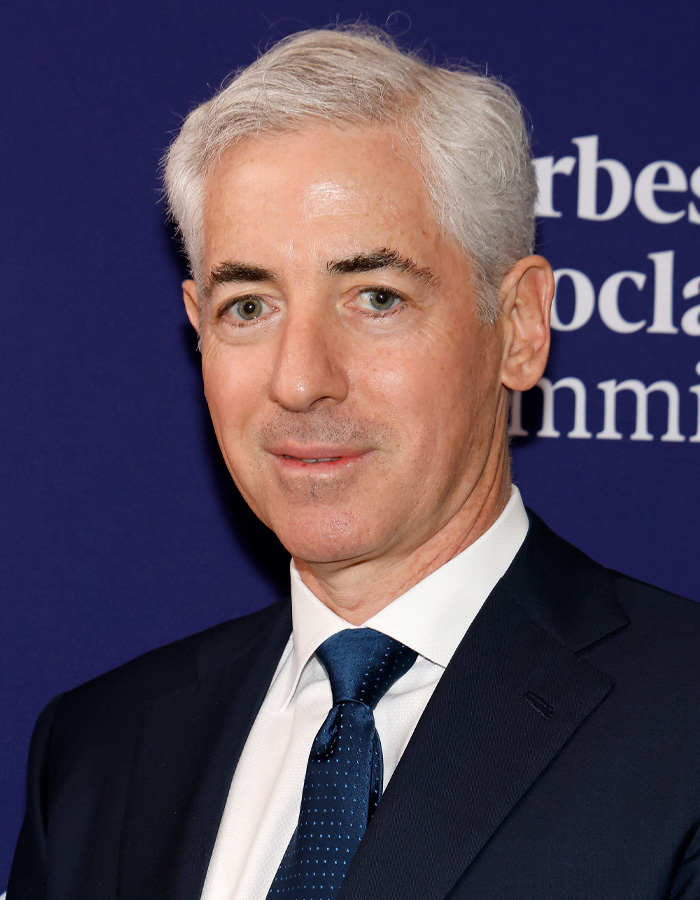 Middle-aged man with gray hair in a dark suit and blue tie, representing ICE agent involved in online fundraiser controversy.