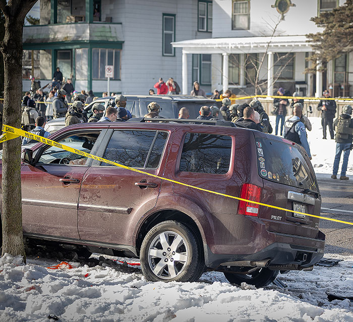 Police investigating scene of woman slain by ICE in her car, a mom of a 6-year-old, in snowy Minneapolis neighborhood.