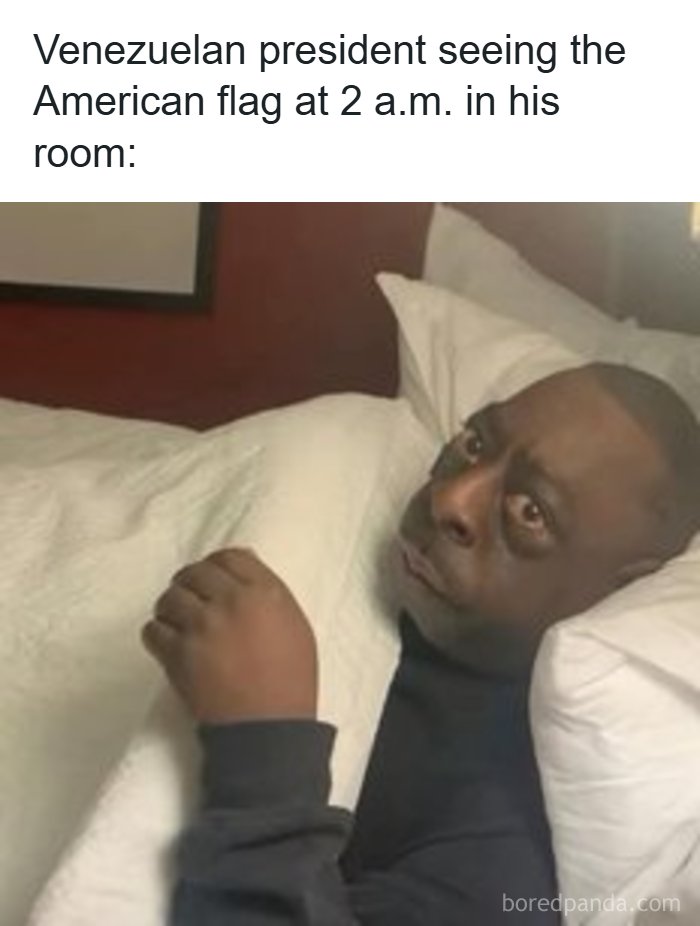 Man wide awake in bed with a shocked expression, a funny screenshot to distract from responsibilities.