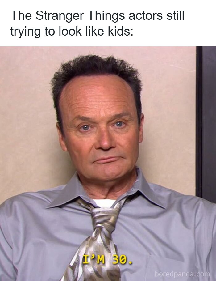 Meme from The Office featuring a man in shirt and tie with text about Stranger Things actors trying to look like kids.