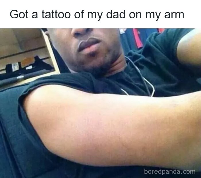 Man showing bare upper arm with caption about a tattoo of his dad, a dark humor meme from hilarious memes collection.