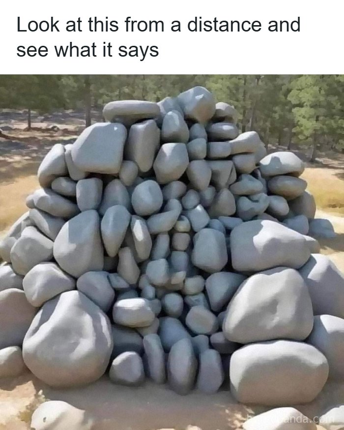 Pile of rocks arranged to form a hidden message, featured in a meme account explaining memes for those who don't get it