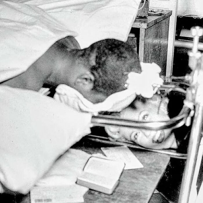 Black and white historical photo showing a medical procedure capturing the sad and sometimes horrific history of humanity.