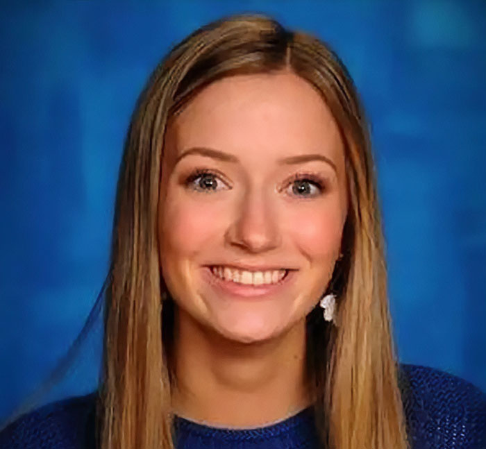 Young woman with long blonde hair smiling in a portrait representing bold texts from teacher to student after hours Young woman with long blonde hair smiling in a portrait representing bold texts from teacher to student after hours