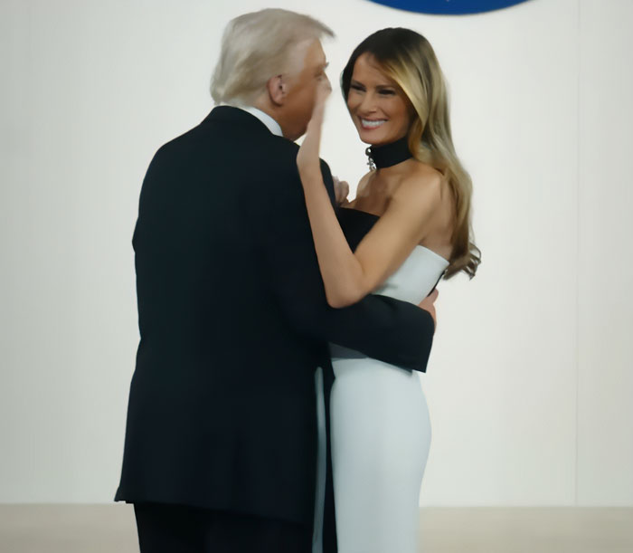 Melania Trump smiling in a white dress embracing a man in a black suit, viral images revealing humiliating documentary truth.