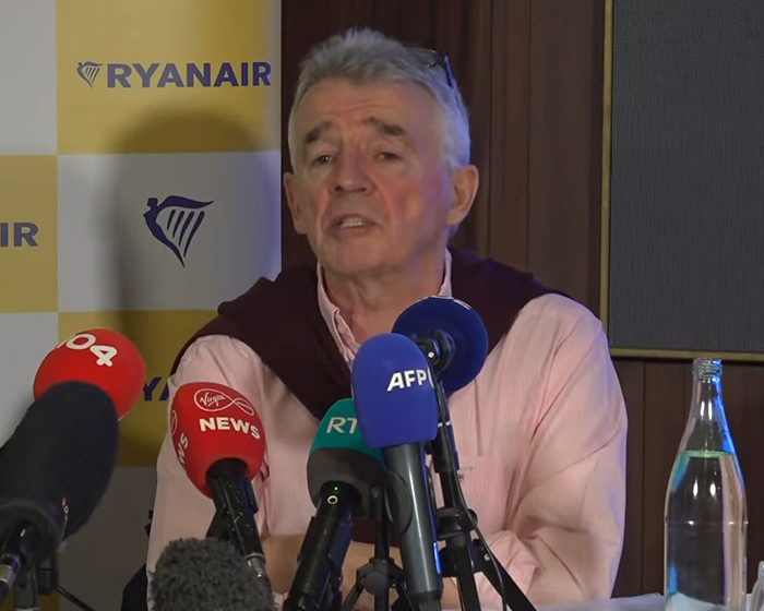 Ryanair spokesperson addressing media during a press conference on Elon Musk Twitter tantrum response.