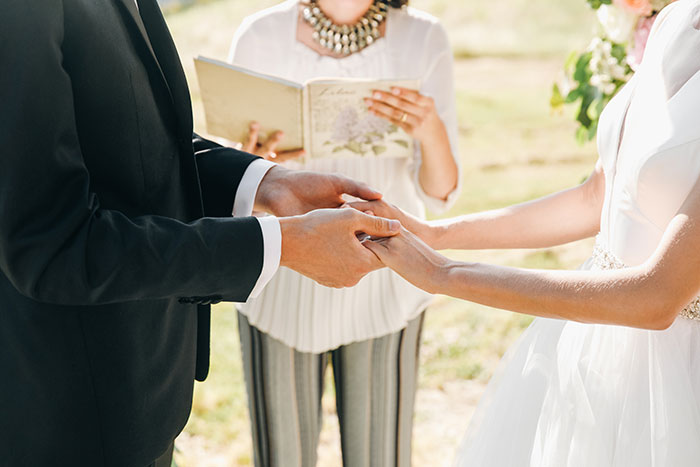 MIL Tries To Ruin Wedding By Trashing Bride To Officiant, Freezes As She Learns Bride Is Her Boss 
