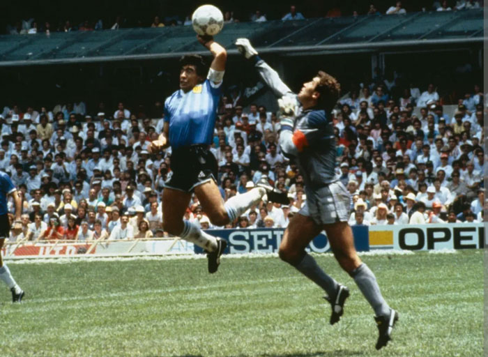 Soccer players competing in a match with a crowded stadium, a photo that hits hard from their countries shared by people.