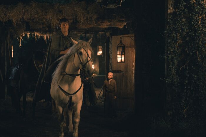 Peter Claffey fuels fan theory showing Ser Duncan The Tall on horseback in a dimly lit medieval setting.