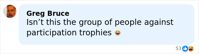 Comment by Greg Bruce questioning a group opposing participation trophies, featuring a laughing emoji.
