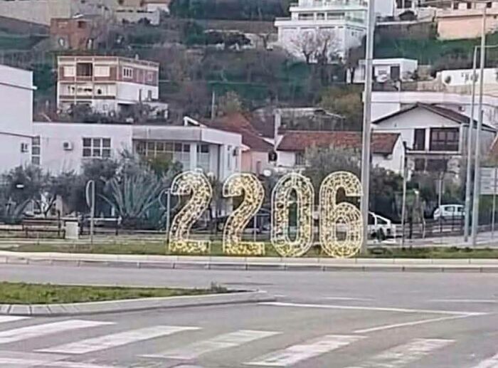 Decorative light numbers 2206 displayed near a residential area capturing a funny Eastern European experience.
