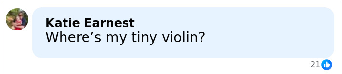 A social media comment by Katie Earnest saying Where’s my tiny violin with 21 likes shown in a chat bubble.