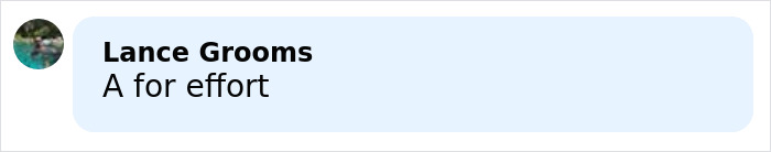 Emilia Clarke smiling during an interview revealing she broke a rib while filming an intimate scene with three men.