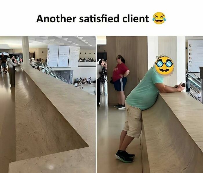 Person humorously leaning on a slanted ledge in a public space, capturing funny Eastern European experience vibes.