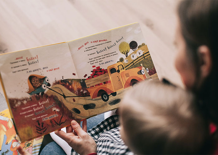 Woman in labor frustrated with neighbor who won&rsquo;t take her kids at 3am while reading a book to a child.