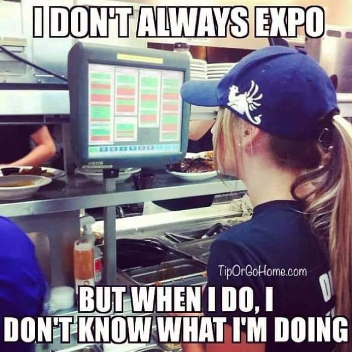 Restaurant worker looking at order screen in kitchen with humorous meme about not knowing tasks.