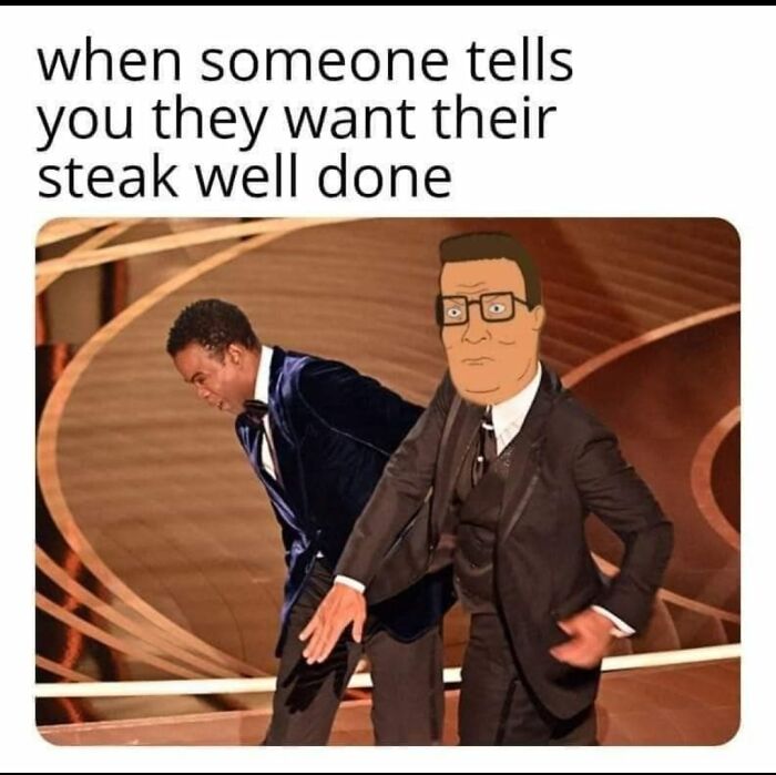 Man in suit reacting with disbelief while another man bends over, illustrating a relatable moment for restaurant workers about steak orders.