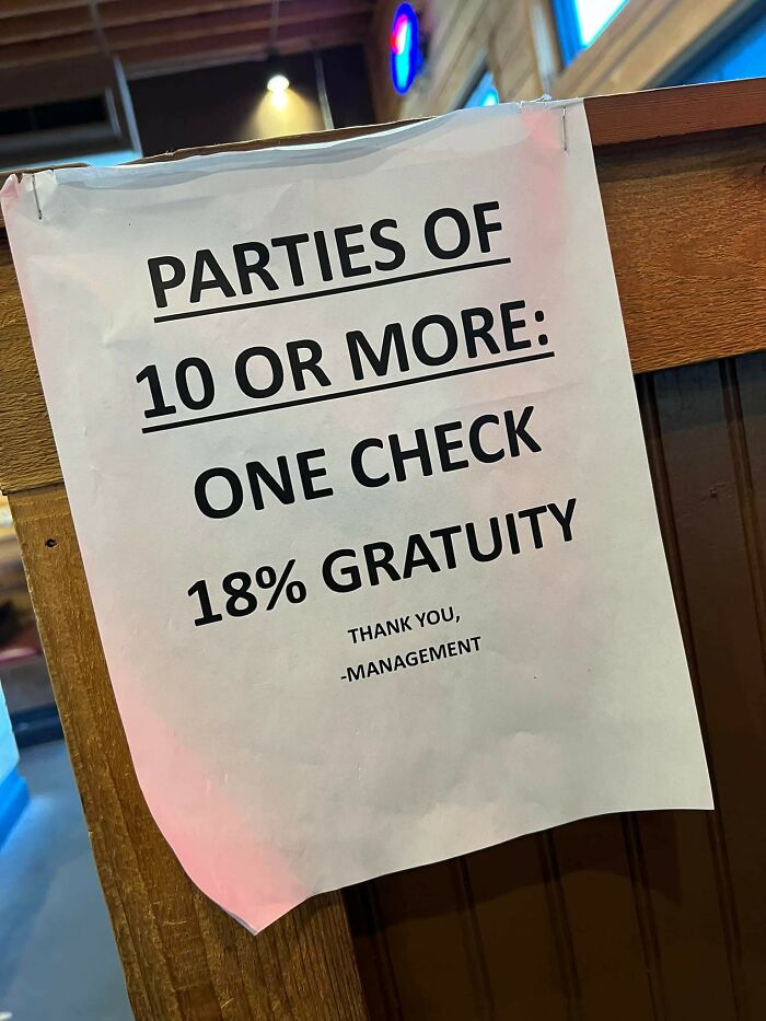 Sign in a restaurant stating parties of 10 or more get one check with 18% gratuity relevant to restaurant workers.