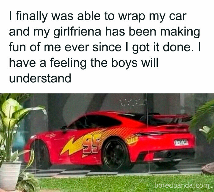 Car wrapped in a Lightning McQueen design with bold red and yellow colors, showcasing random memes humor and creativity.