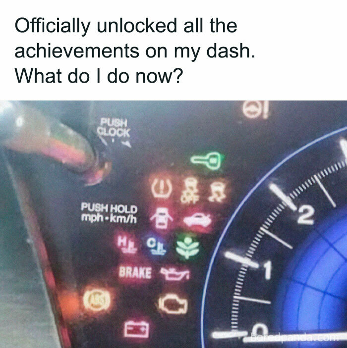 Car dashboard with multiple warning lights on, humorously captioned about unlocking all achievements in random memes.
