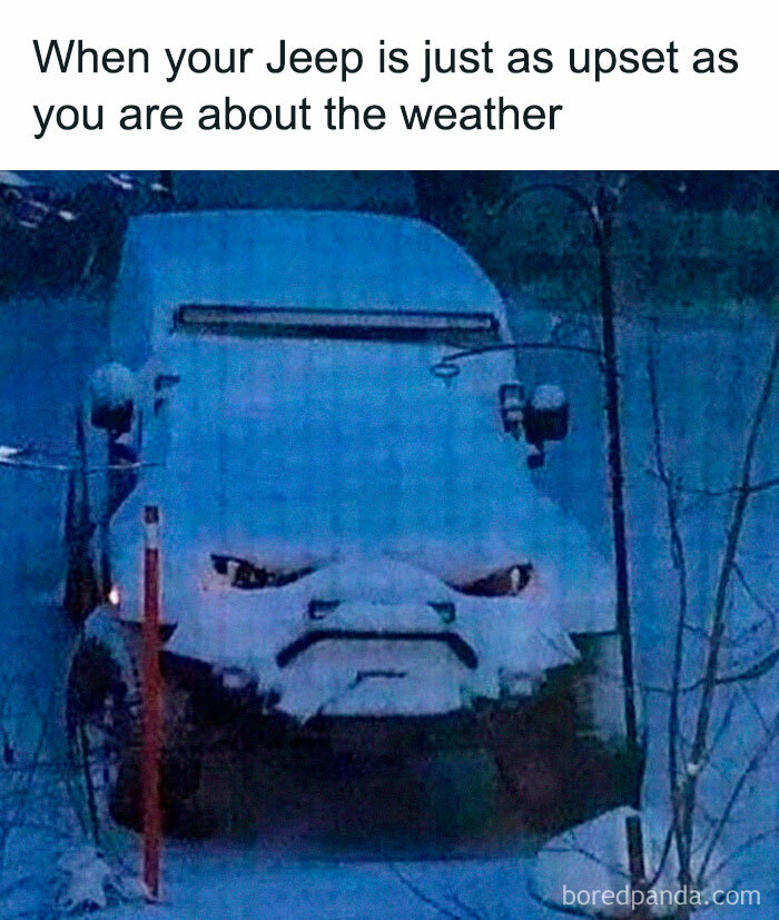 Jeep covered in snow with an angry face created by the snow, capturing a random meme filled with unexpected humor.